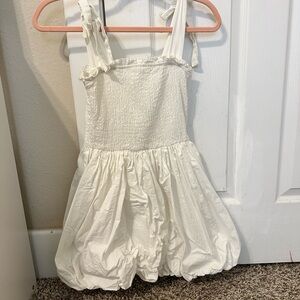 White TCEC dress from a boutique in Dallas. Ties at the shoulders.